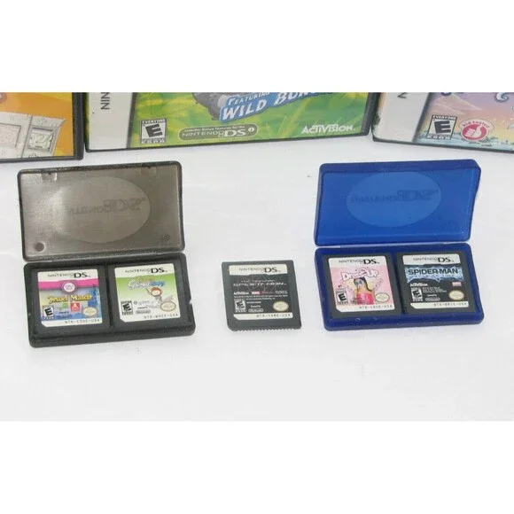 Nintendo DS Blue Handheld Game System with Case, Cord & Lot of 8 Games